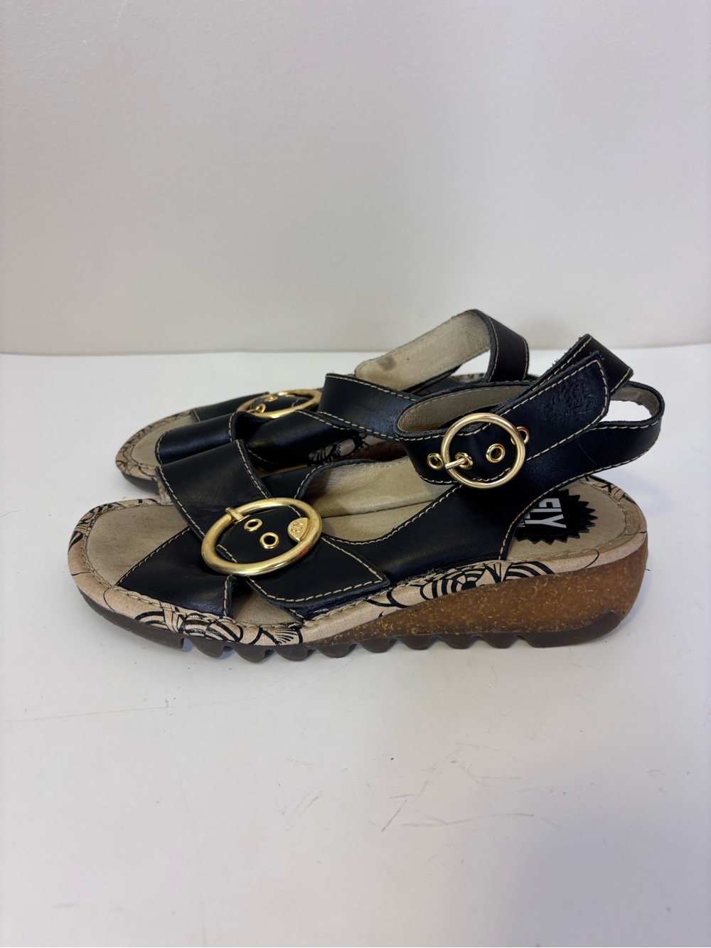 Fly London Black Leather Low Wedge Sandals with Gold Buckles 7